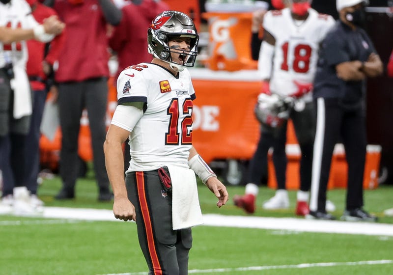 Bucs QB Tom Brady celebrates after a TD pass during Tampa's 30-20 victory of New Orleans.