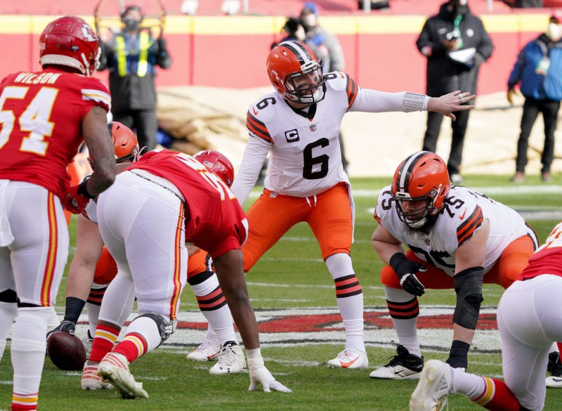 Cleveland Browns quarterback Baker Mayfield (6) signals on the line of scrimmage during the AFC Divisional Round playoff game against the Kansas City Chiefs at Arrowhead Stadium.