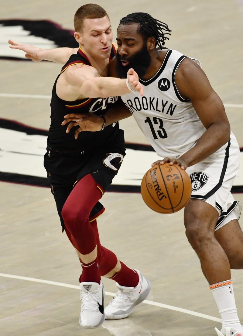 Brooklyn Nets guard James Harden (13) drives to the basket against Cleveland Cavaliers guard Dylan Windler (9) during the third quarter at Rocket Mortgage FieldHouse.