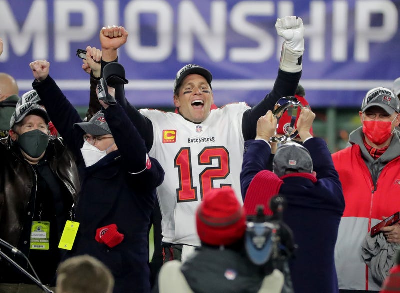 Tom Brady and the Buccaneers celebrate their Super Bowl birth after defeating the Green Bay Packers 31-26.