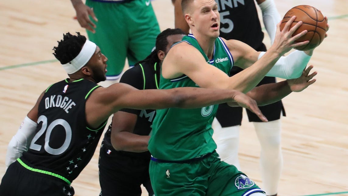 Porzingis, Doncic help Mavericks hold off Wolves, 127-122