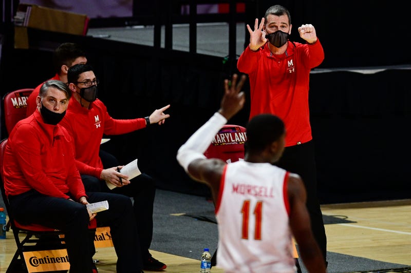 Terps Head Coach Mark Turgeon in the background with Senior Darryl Morsell in the foreground