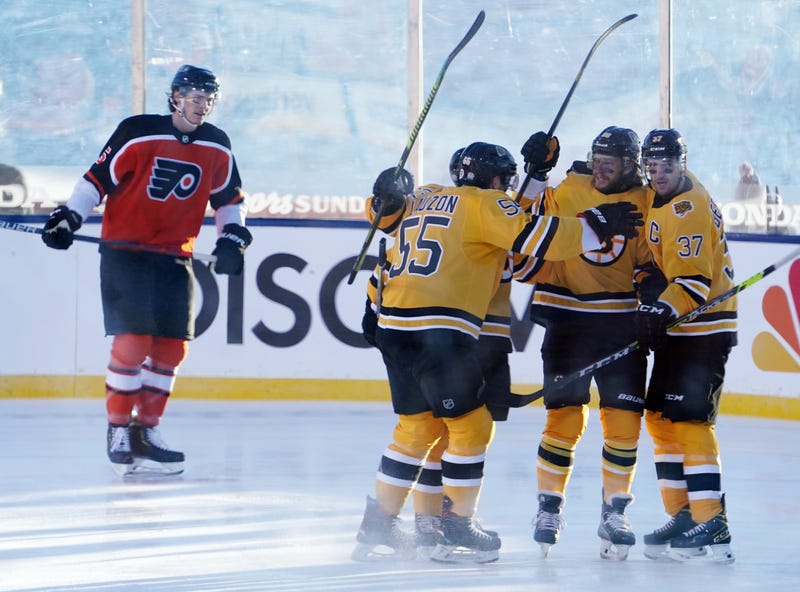 The Bruins celebrate David Pastrnak's first-period goal