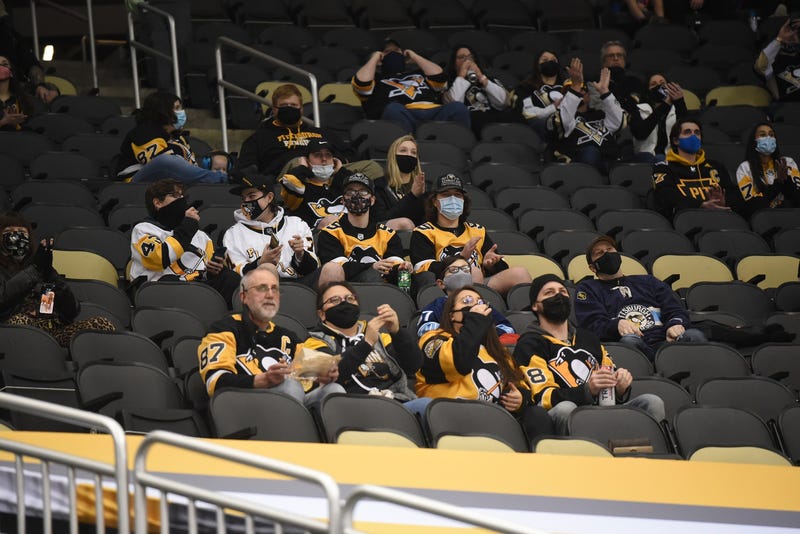 Fans look on from the stands during the game between the Pittsburgh Penguins and the Philadelphia Flyers in the first period at PPG Paints Arena.
