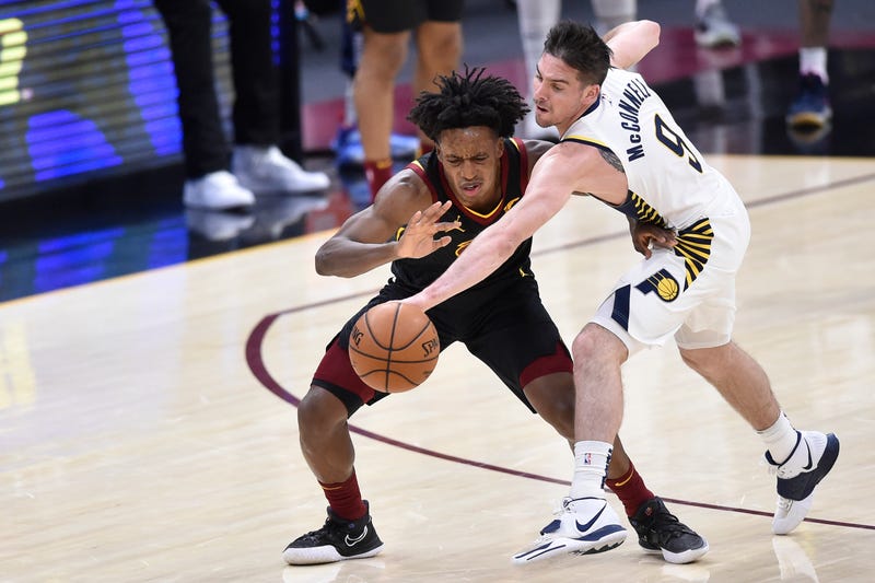 Mar 3, 2021; Cleveland, Ohio, USA; Indiana Pacers guard T.J. McConnell (9) steals the ball from Cleveland Cavaliers guard Collin Sexton (2) late in the fourth quarter at Rocket Mortgage FieldHouse. 