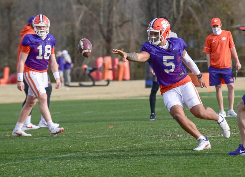 Clemson quarterback D.J. Uiagalelei(5) pitches a ball during football practice in Clemson, S.C. Friday, March 5, 2021