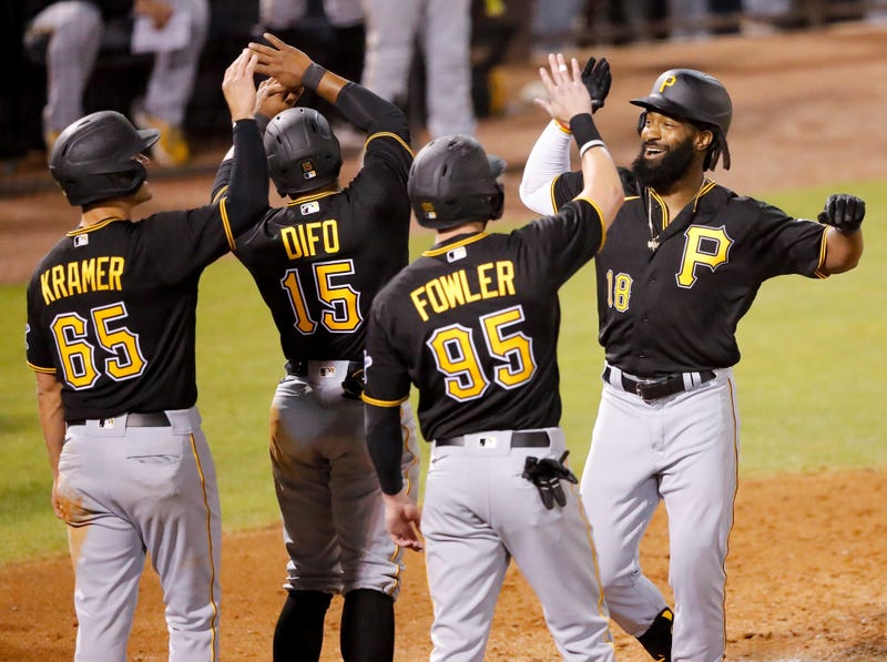 Brian Goodwin celebrates after grand slam