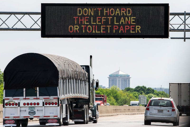 A sign on I-65 near Montgomery, Ala., reads Don't Hoard The Left Lane or Toilet Paper on Monday March 30, 2020.