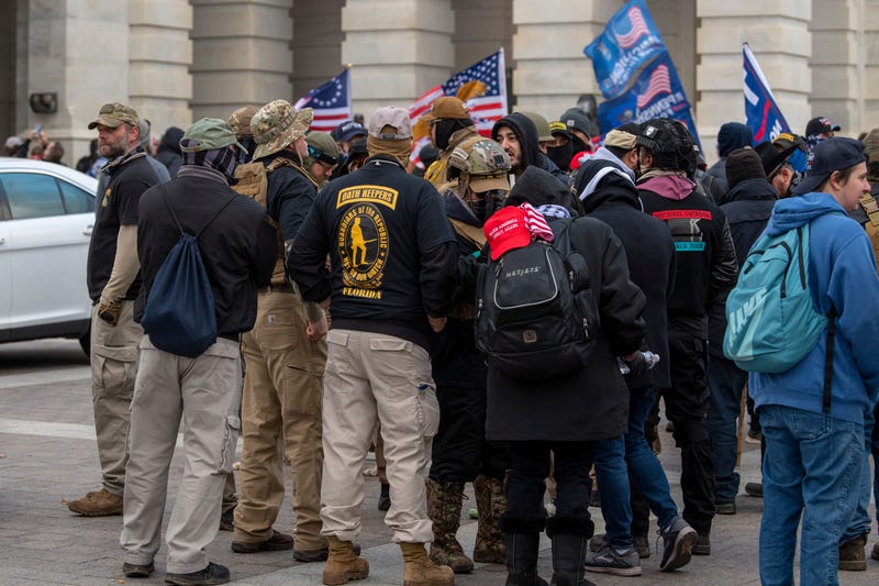 Jan. 6, 2021 Washington, DC, USA; A group of men, some of whom are wearing "Oath Keepers" insignia, gathers as rioters storm the U.S. Capitol in Washington on Jan. 6. 