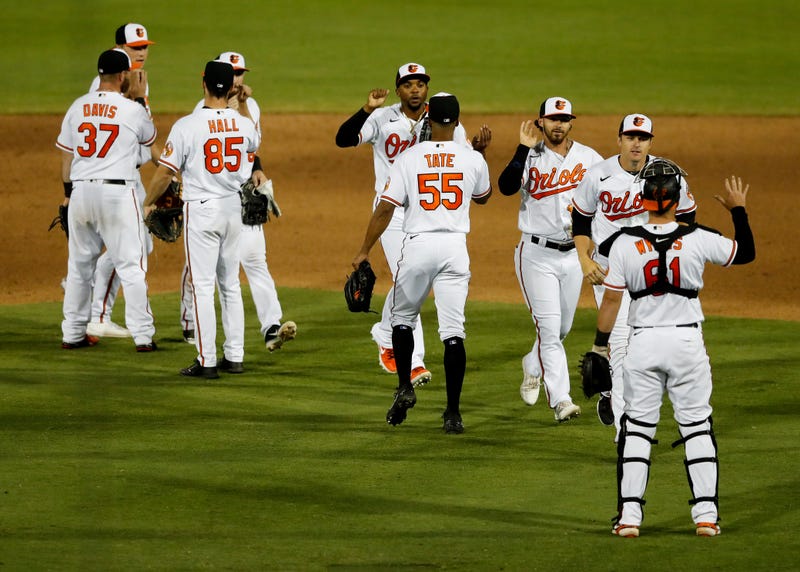 O's players celebrate a Spring Training victory