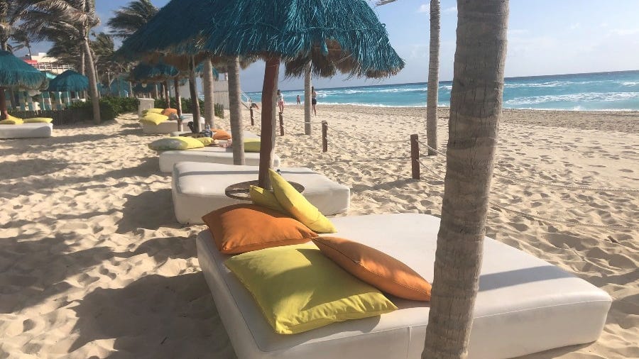 Wild sight: Men on jet skis open fire on Cancun beach