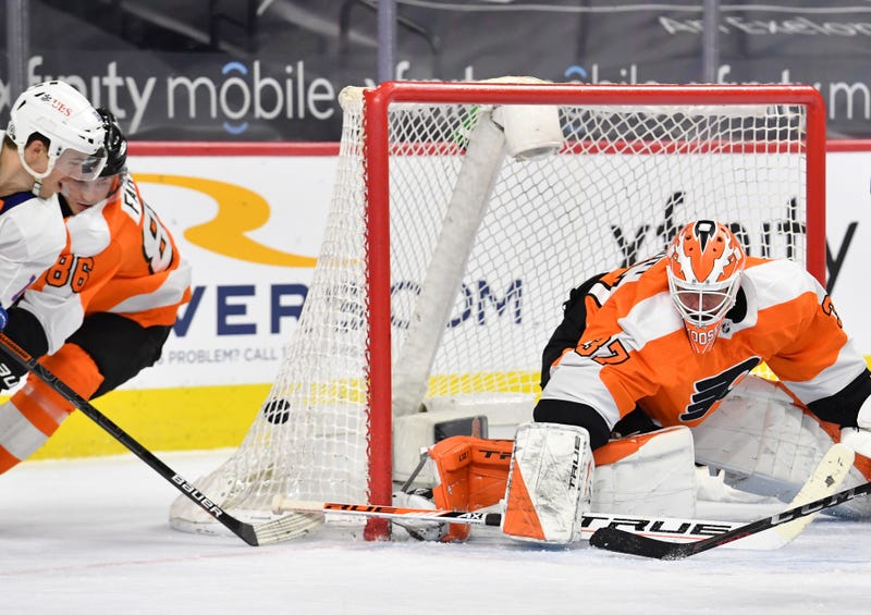 Philadelphia Flyers goaltender Brian Elliott (37) allows a goal scored by New York Islanders left wing Anthony Beauvillier (18) during the overtime period at Wells Fargo Center.