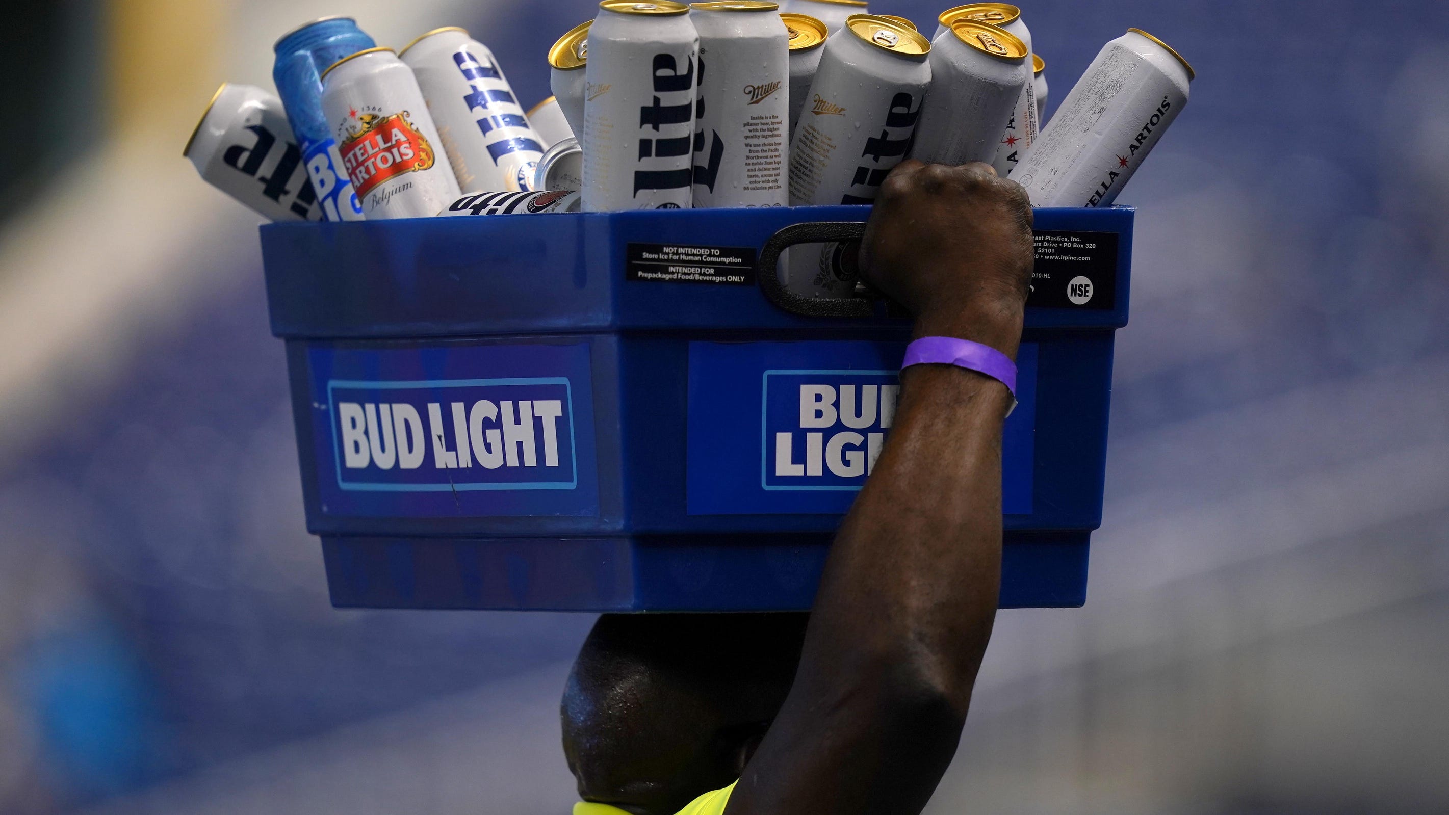 Should you be able to buy alcohol at college sporting events? Some say it would cut down on binge drinking