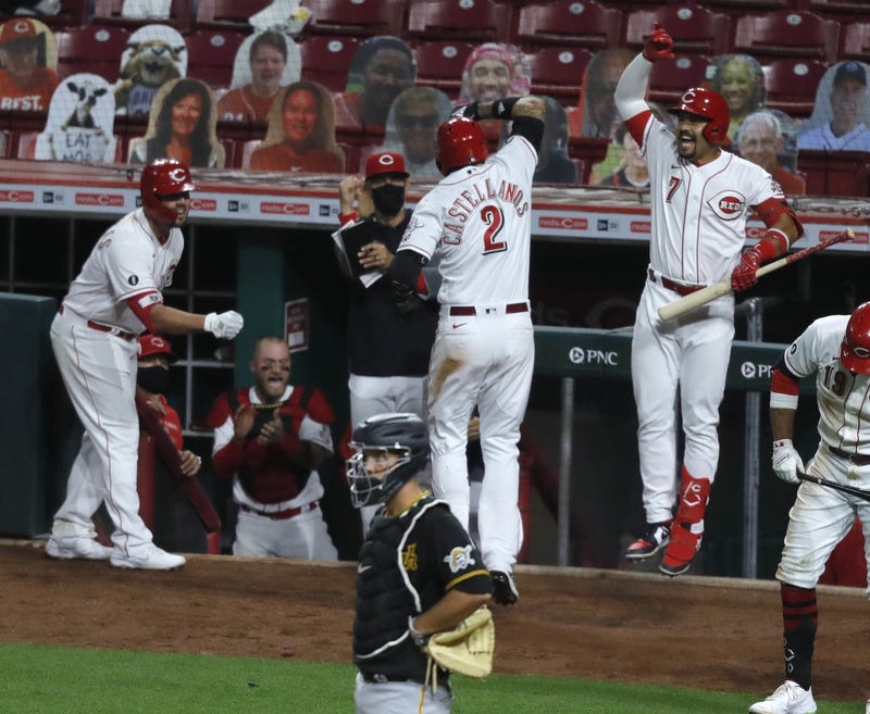 Reds celebrate after homer