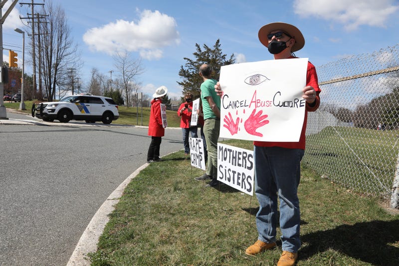 Protestors at the entrance to the Edna Mahan Correction Facility as part of a demonstration organized by New Jersey Prison Justice Watch as they hosted a vigil at Edna Mahan Correctional Facility in Clinton, NJ on March 27, 2021, after reports of violent abuse that left at least two women inmates there with severe injuries in January.