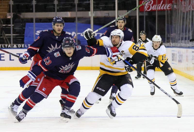 Sidney Crosby hit by Adam Fox