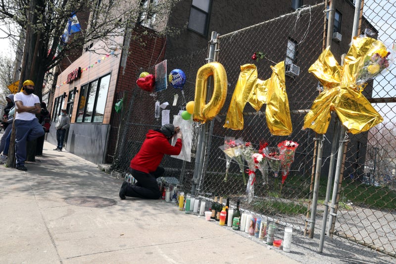 Mourners gather at a memorial for Earl Simmons, the rapper known as DMX, outside White Plains Hospital, in White Plains, April 9, 2021