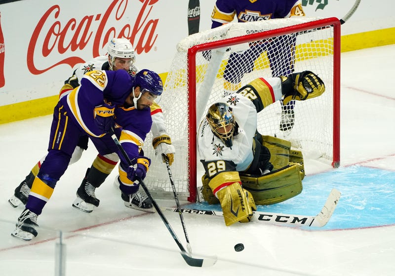 Los Angeles Kings left wing Andreas Athanasiou (22) moves in for a shot against Vegas Golden Knights defenseman Alex Pietrangelo (7) and goaltender Marc-Andre Fleury (29) during the third period at Staples Center.