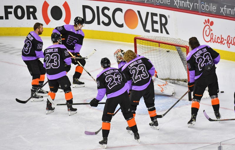 Philadelphia Flyers wear Oskar Lindblom jerseys on Hockey Fights Cancer night during warm-ups before a game against the New York Islanders at Wells Fargo Center.
