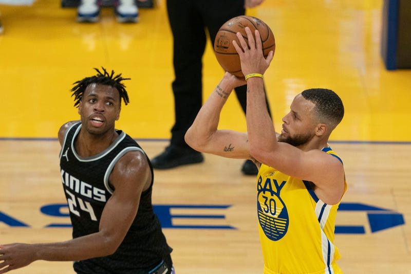 Warriors guard Stephen Curry attempts a jumpshot.