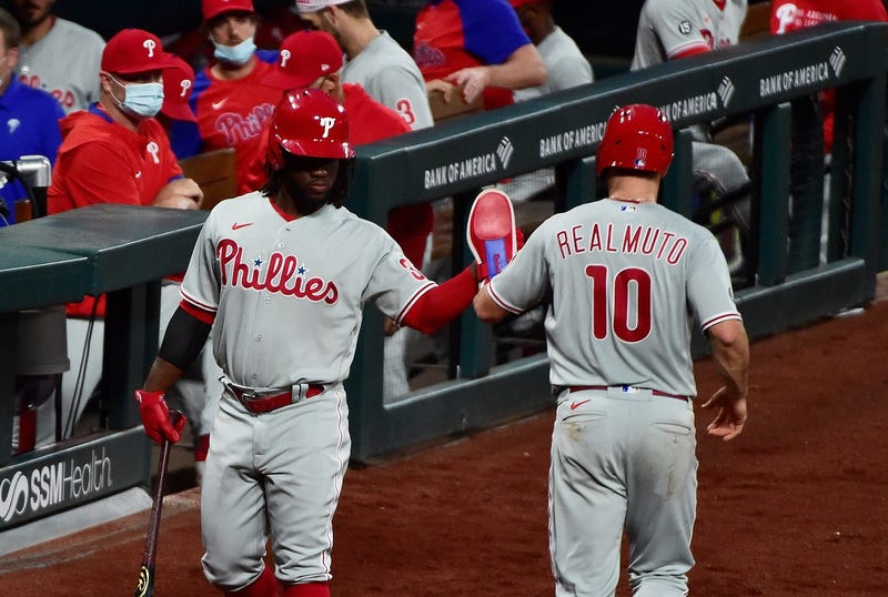 Philadelphia Phillies center fielder Odubel Herrera congratulates catcher J.T. Realmuto.
