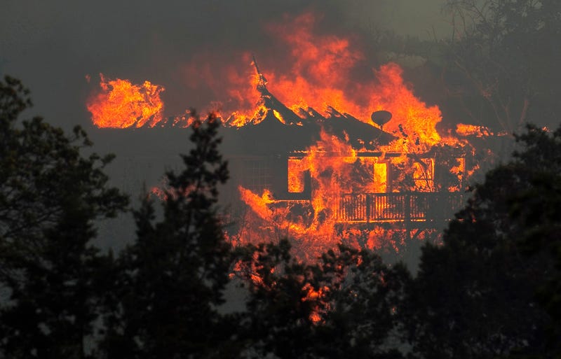 A house burns to the ground in the Steiner Ranch neighborhood in Austin Sept. 4, 2011.