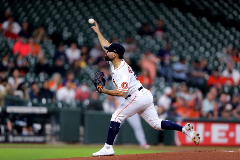 Houston Astros starting pitcher Jose Urquidy (65) pitches against the Los Angeles Angels during the first inning at Minute Maid Park.