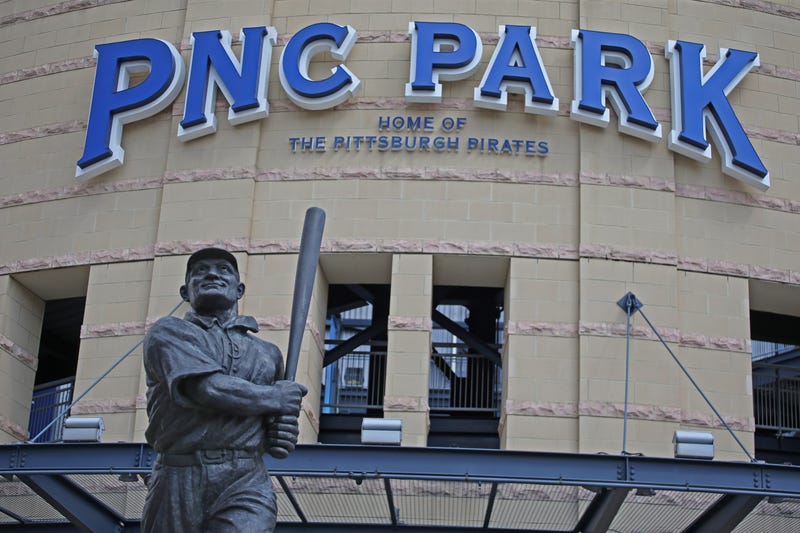 ittsburgh, Pennsylvania, USA; View of the Honus Wagner statue and the marquee at the main entrance of PNC Park 
