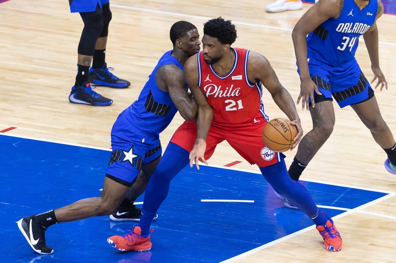 Philadelphia 76ers center Joel Embiid (21) drives against Orlando Magic guard Dwayne Bacon (8) during the third quarter at Wells Fargo Center.