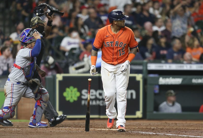 Houston Astros catcher Martin Maldonado (15) watches his two run home run against the Texas Rangers in the fifth inning at Minute Maid Park.