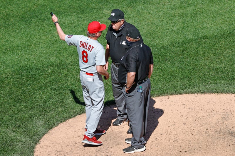 Cardinals Manager Mike Shildt argues with Joe West after Giovanny Gallegos' hat was taken because of a foreign substance on his hat.