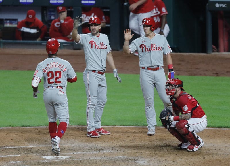From left: Philadelphia Phillies left fielder Andrew McCutchen, outfielder Matt Joyce, and catcher J.T. Realmuto