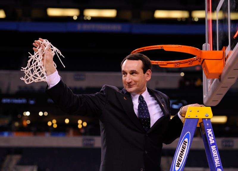 Coach K cuts down the net after winning 2009-10 NCAA Championship
