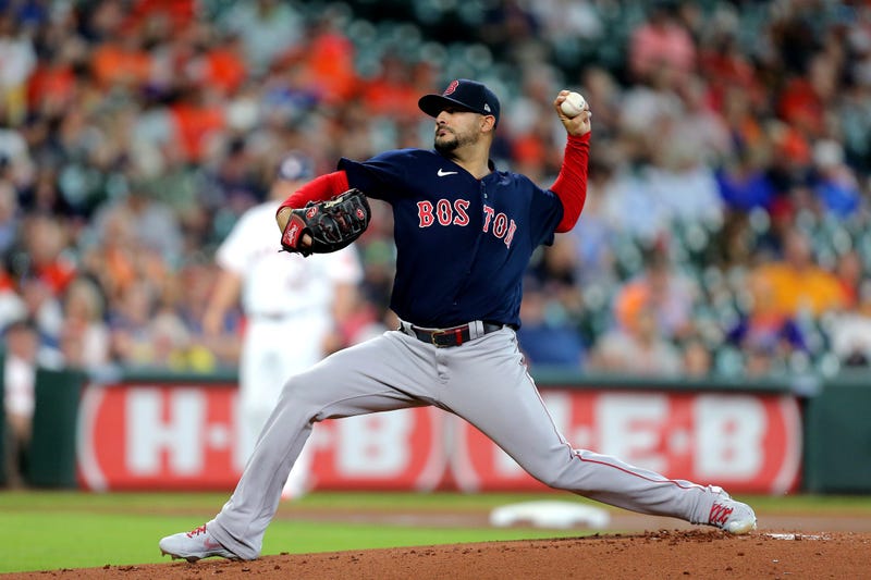 Boston Red Sox starting pitcher Martin Perez (54) delivers a pitch against the Houston Astros during the first inning at Minute Maid Park.