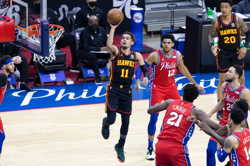 Hawks star Trae Young drives to the hoop.