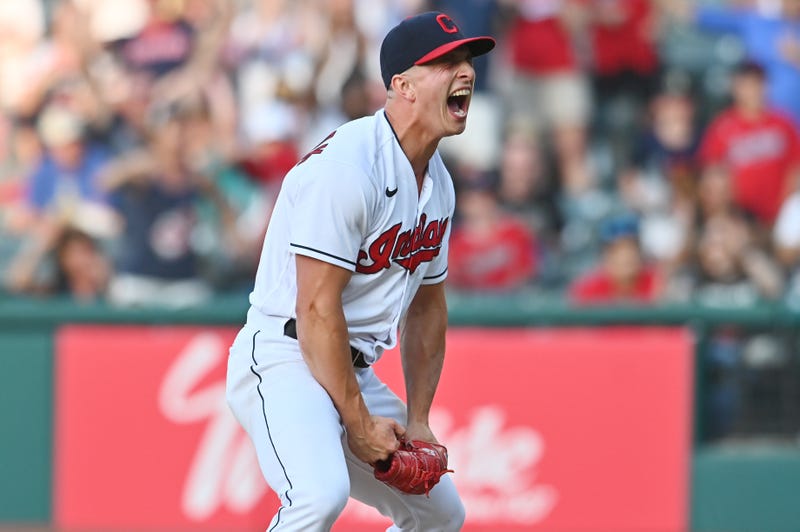 Jun 12, 2021; Cleveland, Ohio, USA; Cleveland Indians relief pitcher James Karinchak (99) reacts after striking out Seattle Mariners catcher Tom Murphy (not pictured) to end the tenth inning at Progressive Field.