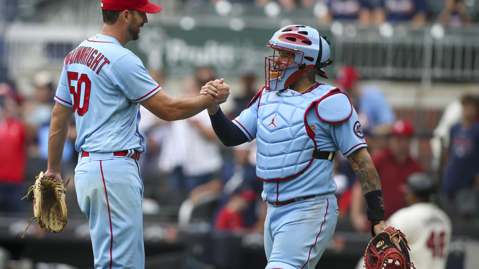 Molina, Wainwright combine for historic day in Cardinals win