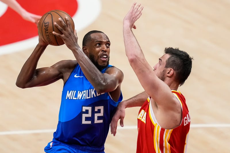 Bucks star Khris Middleton drives to the hoop.