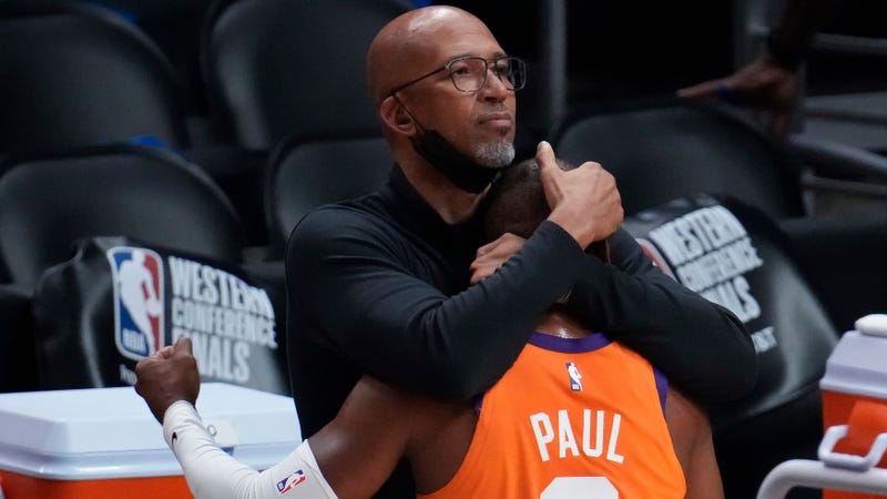 Phoenix Suns head coach Monty Williams hugs guard Chris Paul