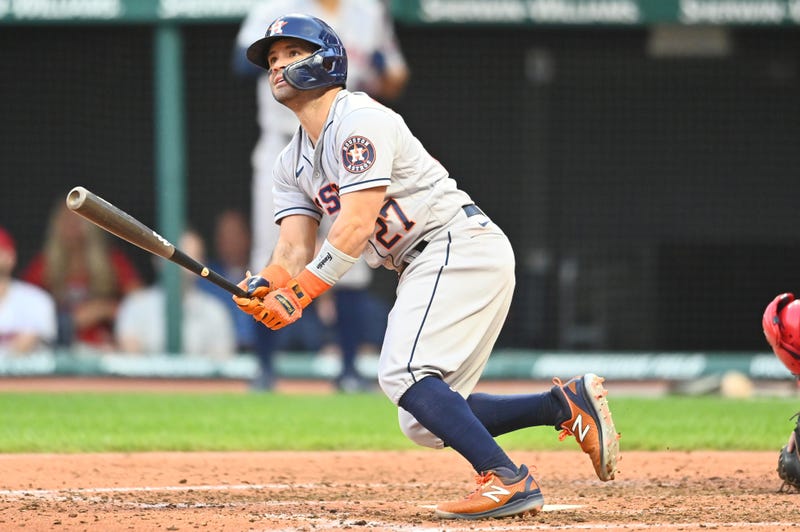 Houston Astros second baseman Jose Altuve (27) hits a grand slam during the fifth inning against the Cleveland Indians at Progressive Field.