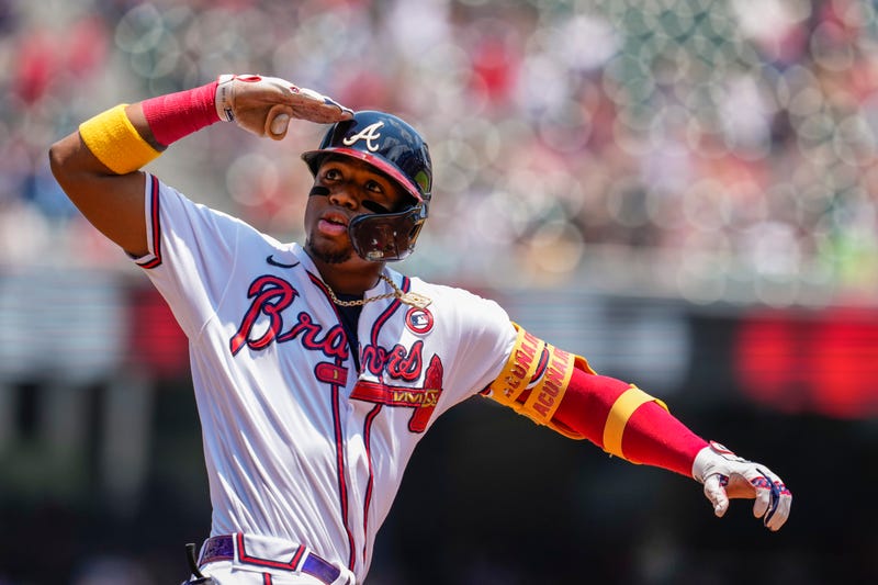 Atlanta Braves right fielder Ronald Acuna Jr. (13) reacts after hitting a two run home run against the Miami Marlins