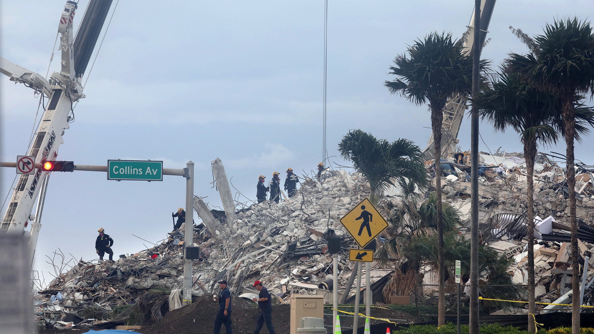Rescue teams return to Surfside condo site after demolition