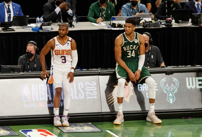 Suns star Chris Paul and Bucks star Giannis Antetokounmpo.
