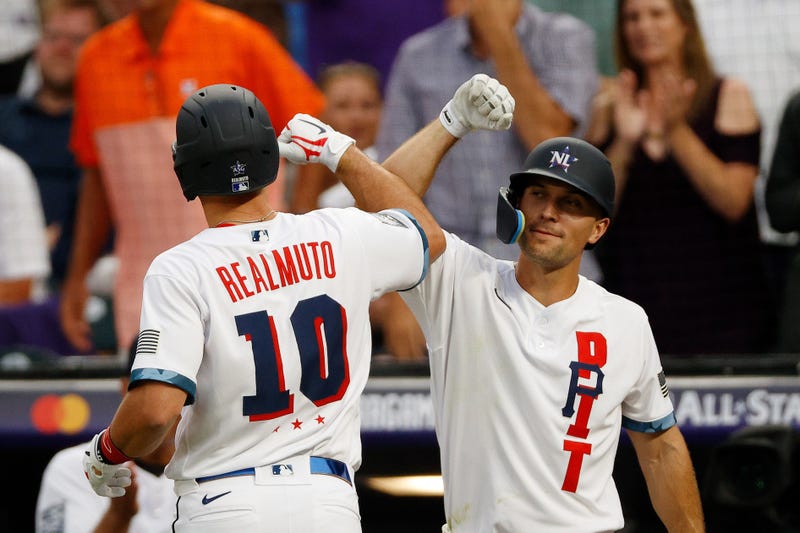 National League catcher J.T. Realmuto of the Philadelphia Phillies (10) celebrates his home run against the American League