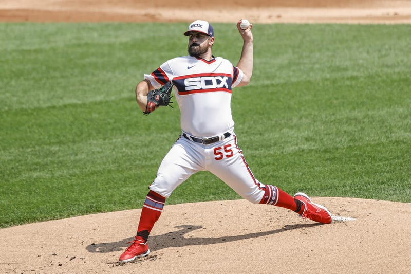 Chicago White Sox starting pitcher Carlos Rodon (55) throws a pitch against the Houston Astros during the first inning at Guaranteed Rate Field.