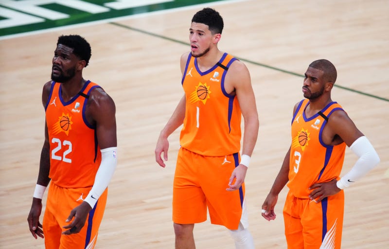 Suns stars Chris Paul, Devin Booker, and Deandre Ayton.