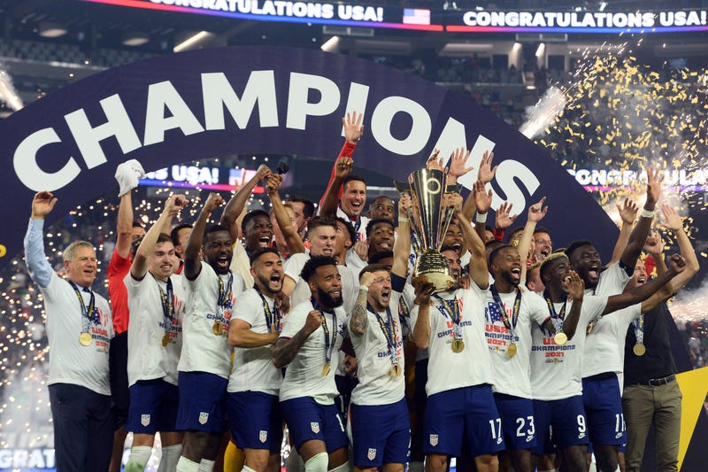 The United States celebrates after defeating Mexico in the CONCACAF Gold Cup final soccer match at Allegiant Stadium. 