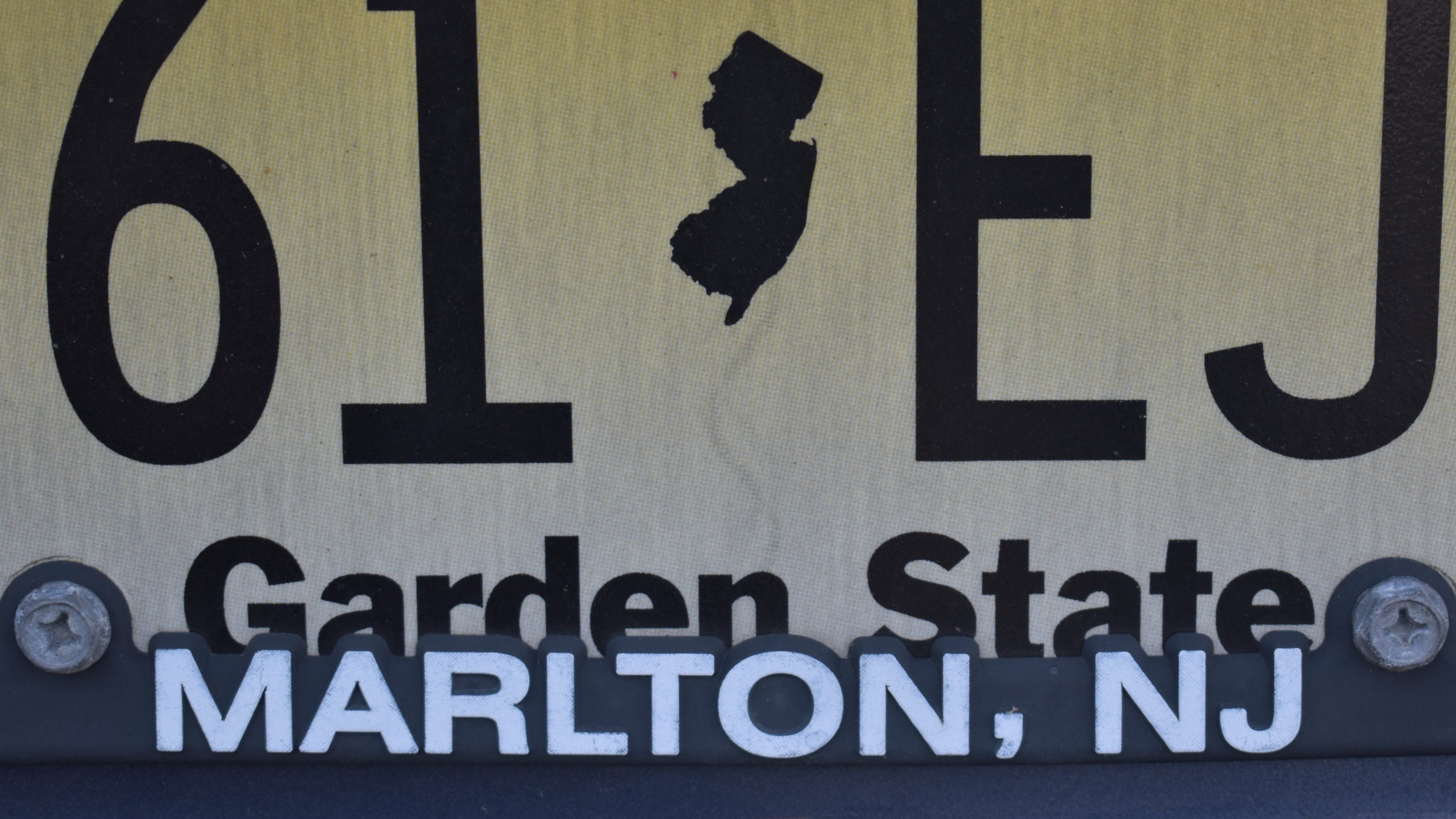 NJ high court rules license plate frames are legal as long as number is legible