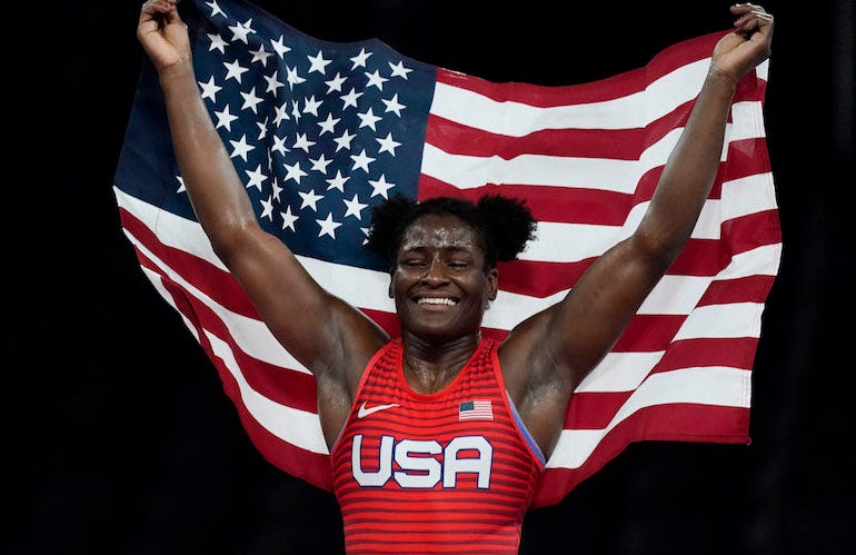 Tamyra Mensah-Stock celebrates after winning the gold medal
