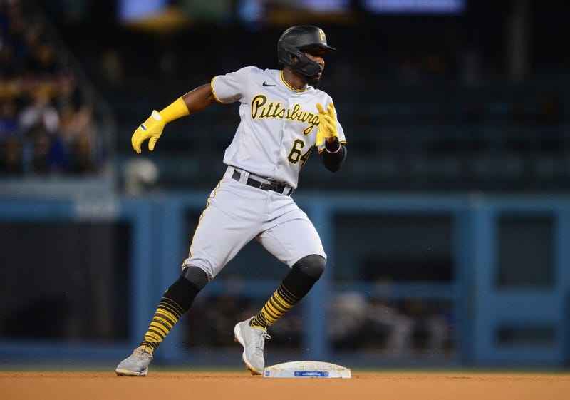 Pittsburgh Pirates second baseman Rodolfo Castro (64) reaches second against the Los Angeles Dodgers 